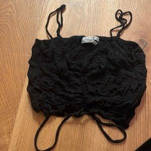 Black ruffled crop top